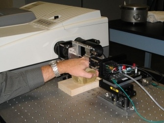 Collecting near infrared spectra of interstitial fluid through a skin fold on the back of the hand